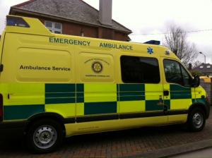 A photo of the ambulance with Wadebridge Rotary Club's Logo